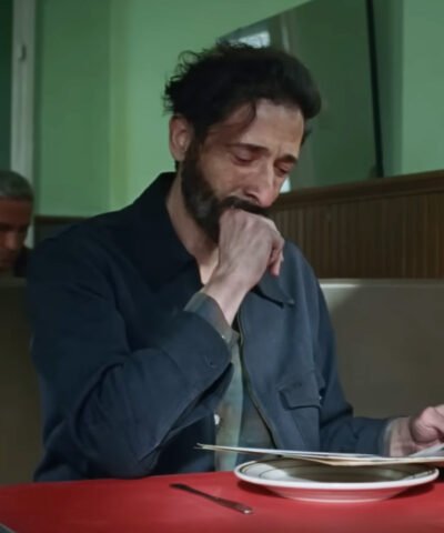 Movie The Brutalist 2024 László Tóth Blue Jacket